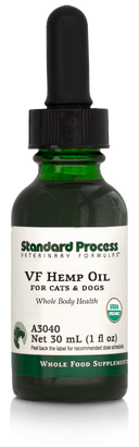 Image of a bottle of liquid VF Hemp Oil from Standard Process Veterinary Formulas next to a dropper that is included with the bottle.