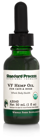 Image of a bottle of liquid VF Hemp Oil from Standard Process Veterinary Formulas next to a dropper that is included with the bottle.